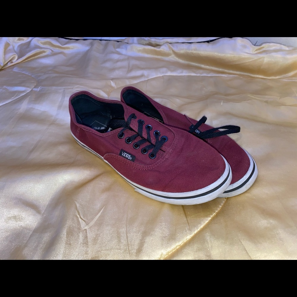 Maroon and black vans